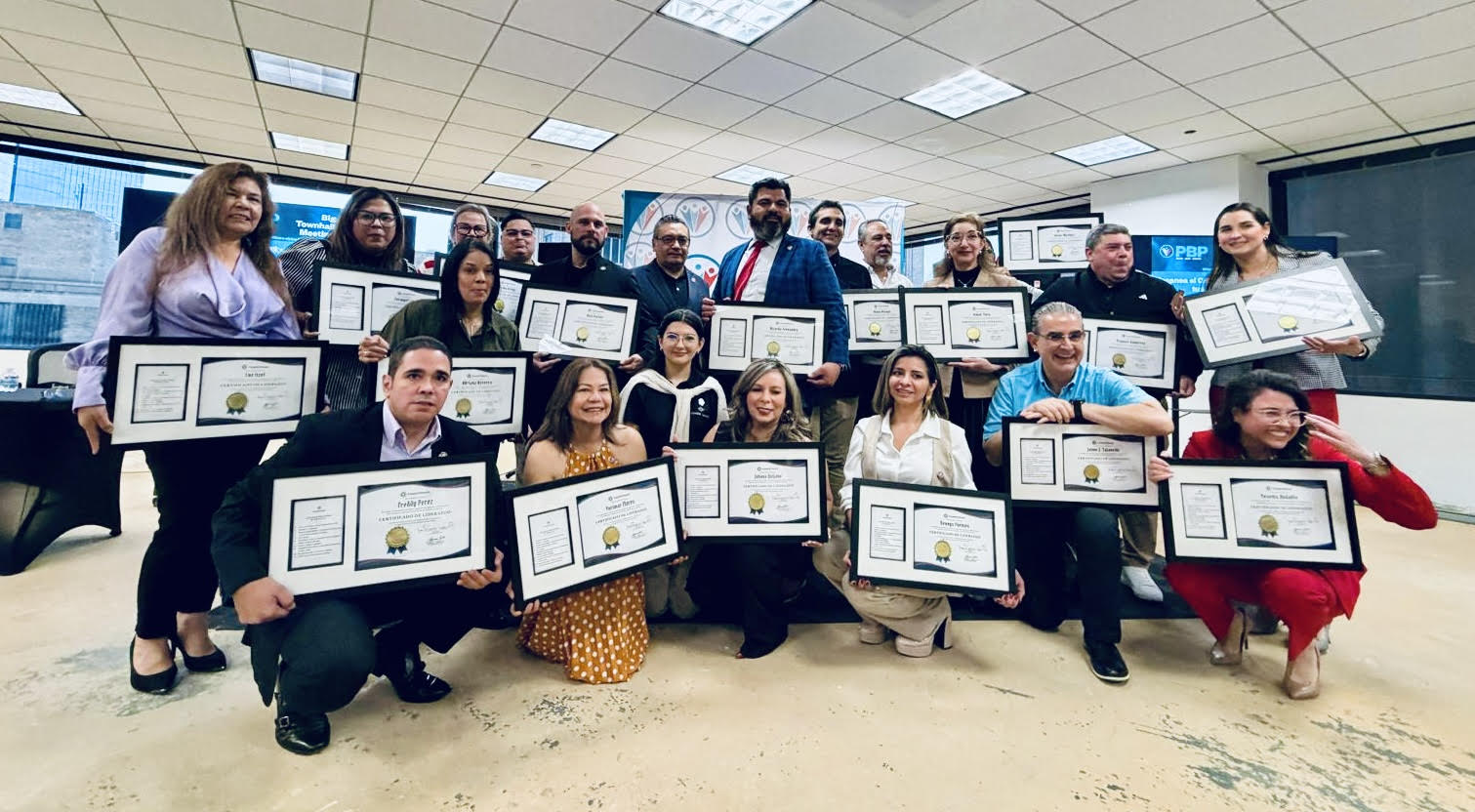 CreateInterest graduation ceremony celebrating team members who completed the SADE training program